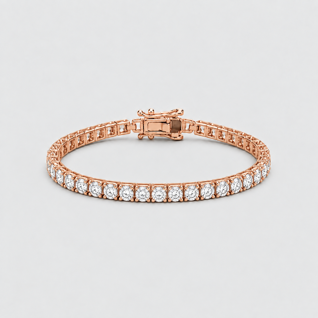 A rose gold tennis bracelet with a row of round-cut clear gemstones, shown on a light gray background.