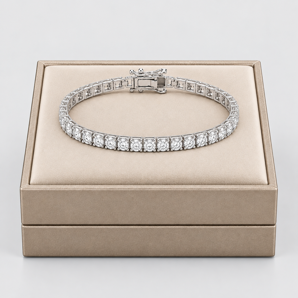 A diamond tennis bracelet with a silver-toned clasp, displayed inside a beige jewelry box on a light gray background.