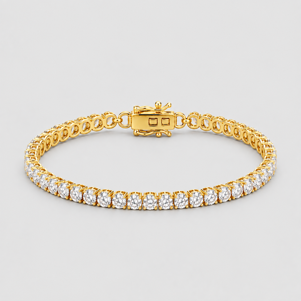 A yellow gold tennis bracelet featuring a row of round-cut clear stones along the front, displayed on a neutral light gray background.