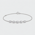 A delicate silver chain bracelet featuring five round-cut clear gemstones set in a row, displayed on a clean light gray background.