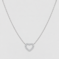 A delicate silver chain necklace featuring a small open heart-shaped pendant encrusted with clear stones, presented on a light gray background.