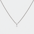 A delicate silver chain necklace with a small bow-shaped pendant set with clear gemstones, displayed against a light gray background.