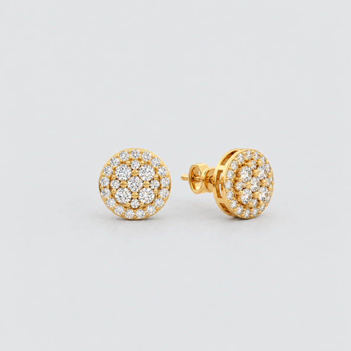 A pair of round gold stud earrings with pavé-set clear stones, shown from front and side angles on a light gray background.