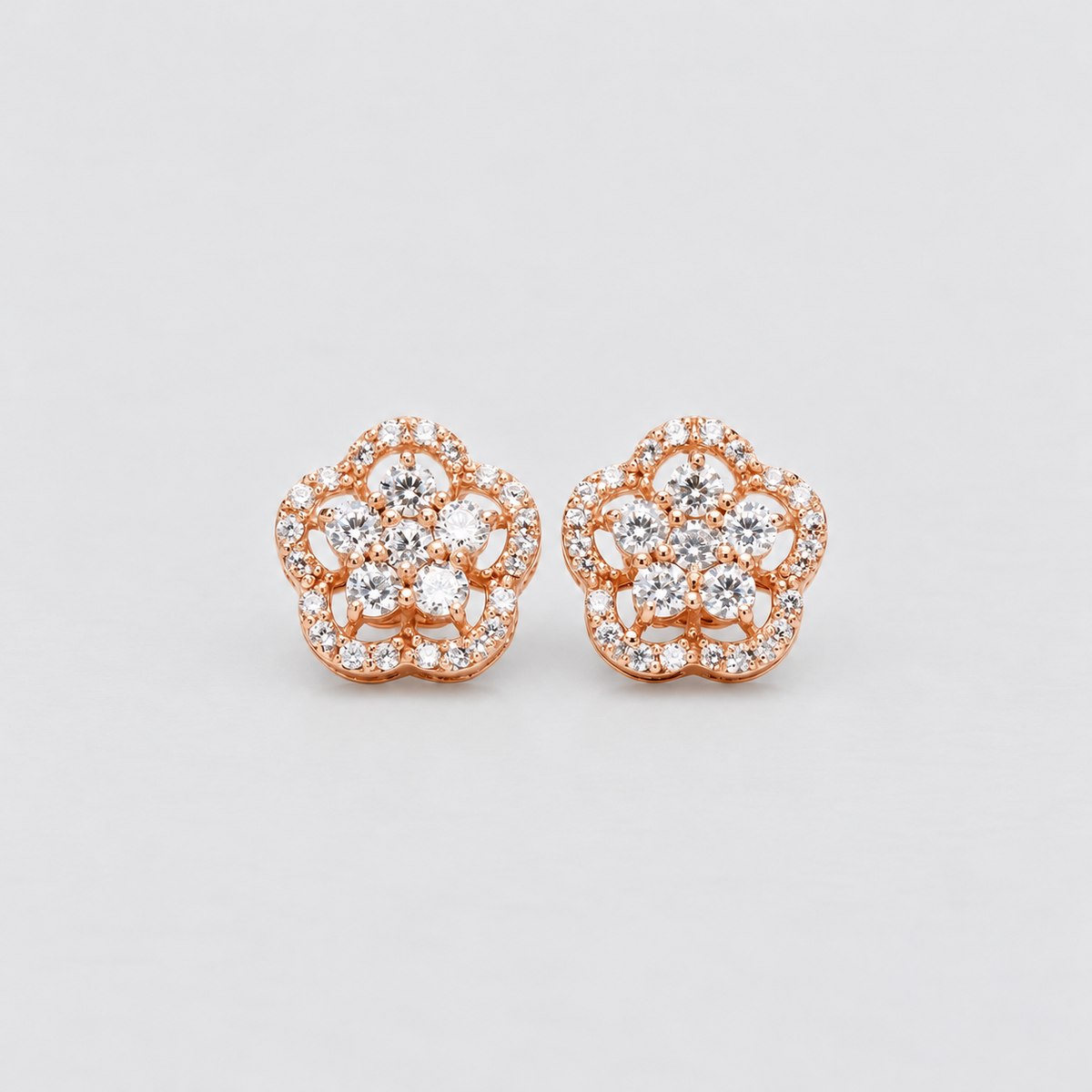 Floral diamond cluster stud earrings in rose gold