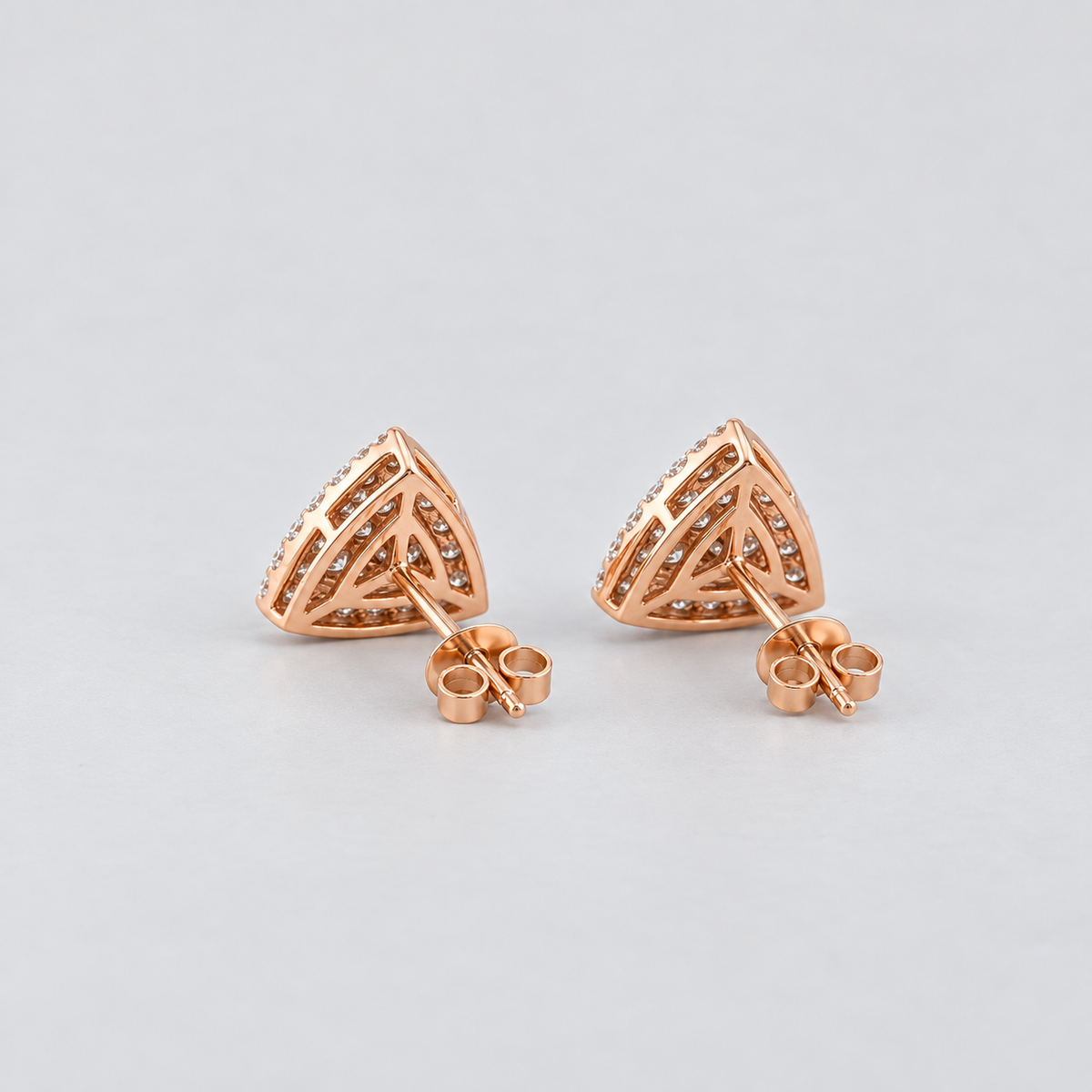 Rose gold triangular cluster diamond stud earrings for women
