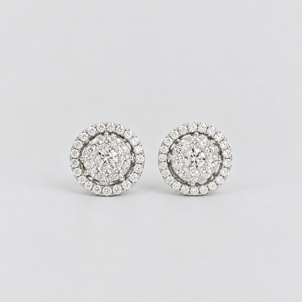 Round cluster diamond stud earrings in white gold with a halo border