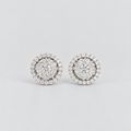 Round cluster diamond stud earrings in white gold with a halo border
