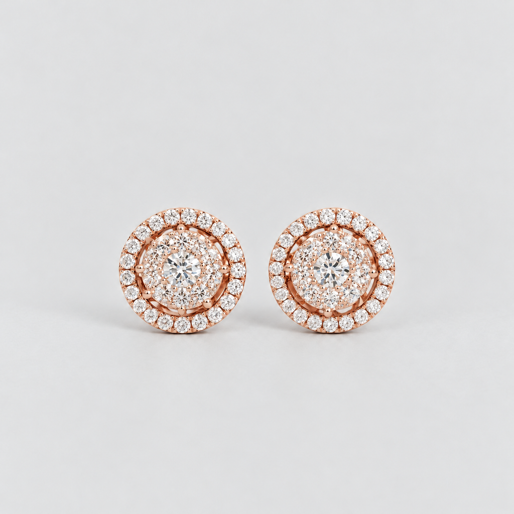 Round cluster diamond stud earrings in rose gold with a halo border