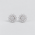 Elegant cluster diamond stud earrings for women, floral halo design with round cut diamonds in white gold.
