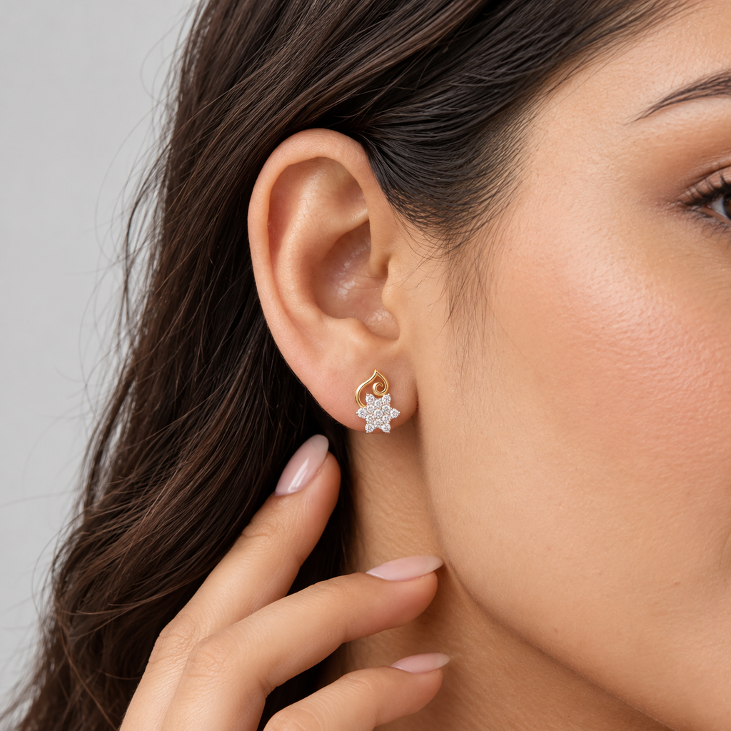 Close-up view of a woman wearing a flower-shaped cluster diamond stud earring.
