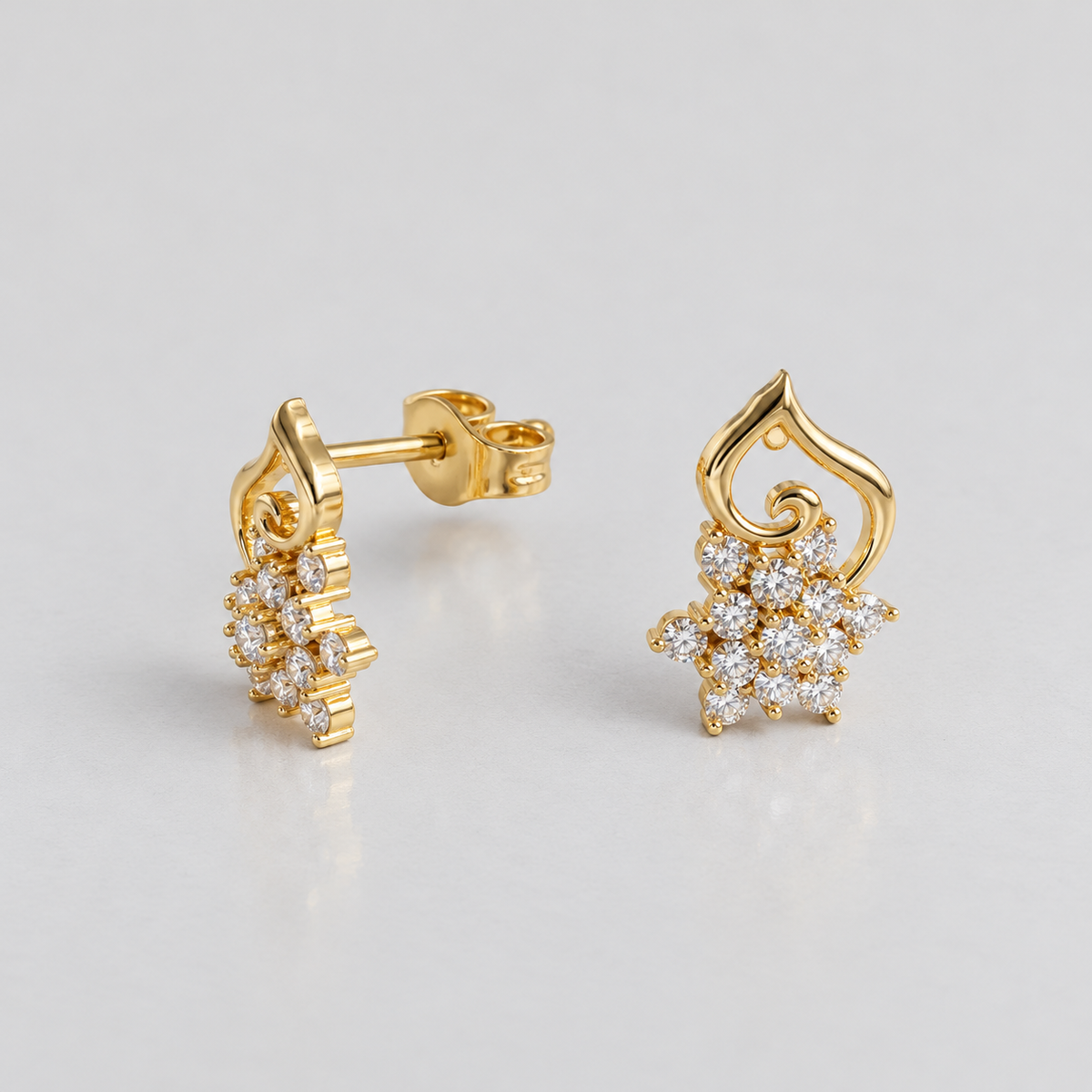 Gold floral cluster diamond stud earrings for women
