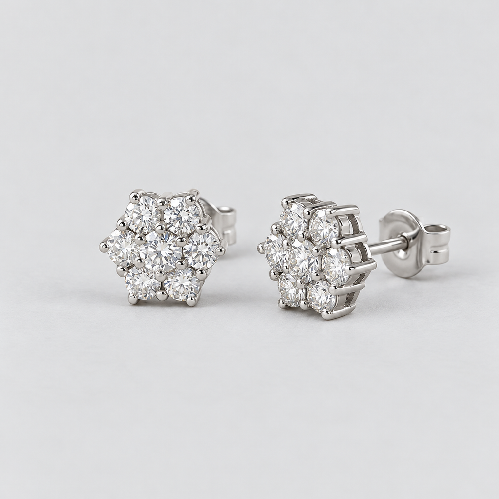 Pair of women's round flower cluster lab-grown diamond stud earrings set in white gold.
