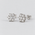 Pair of women's round flower cluster lab-grown diamond stud earrings set in white gold.