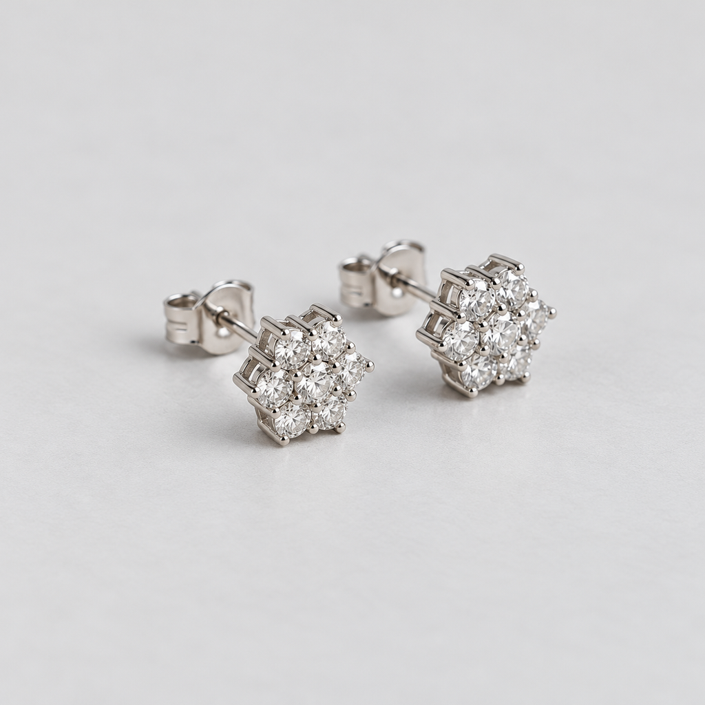 Close-up shot of elegant white gold cluster diamond stud earrings for women.