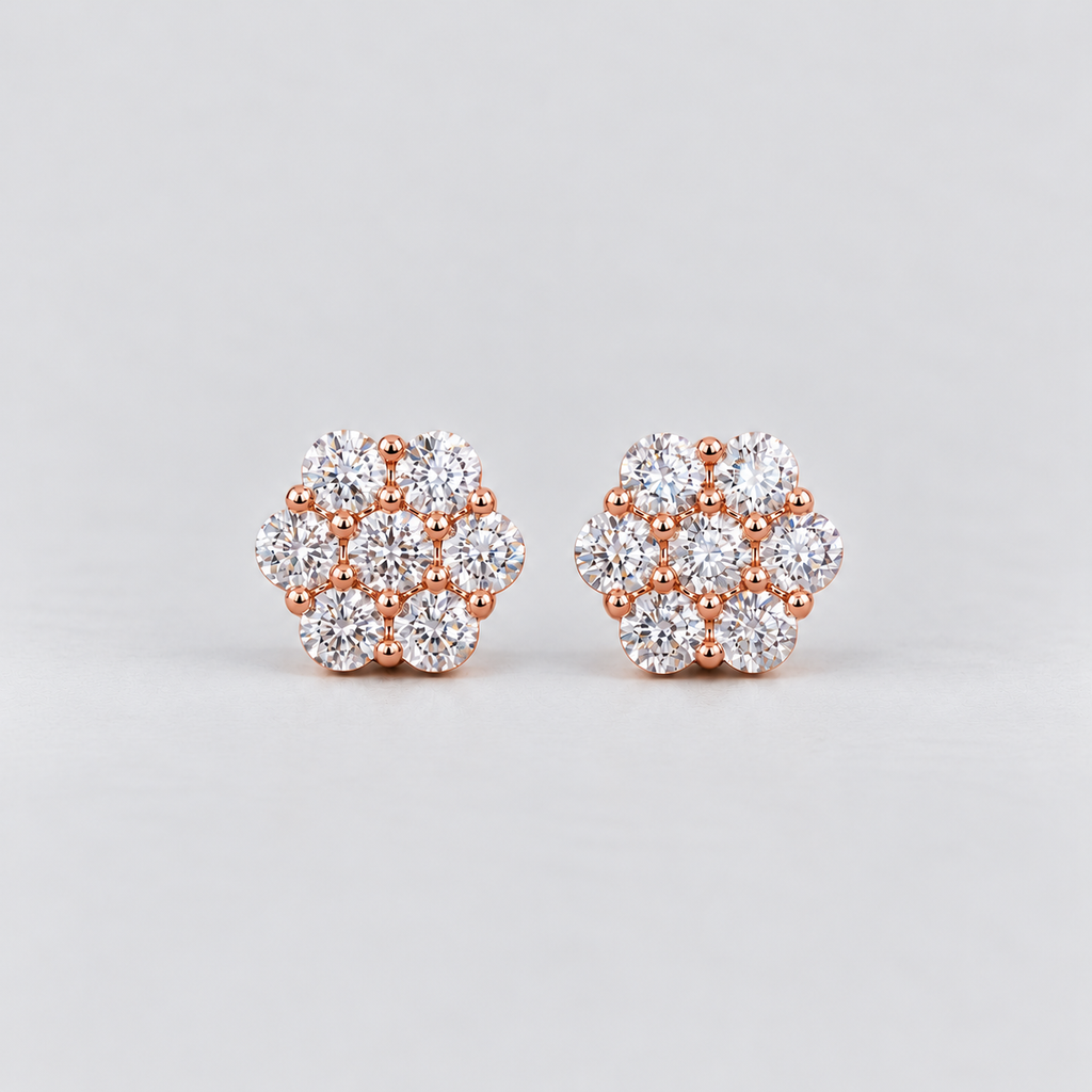 A pair of women's diamond cluster stud earrings in a hexagonal floral pattern in rose gold metal.