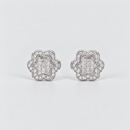 A pair of silver-toned flower-shaped stud earrings paved with clear cubic zirconia stones, displayed on a clean light gray background.