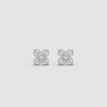 A pair of silver-toned square stud earrings with a floral or clover-like design set with small clear stones, shown on a light gray background.