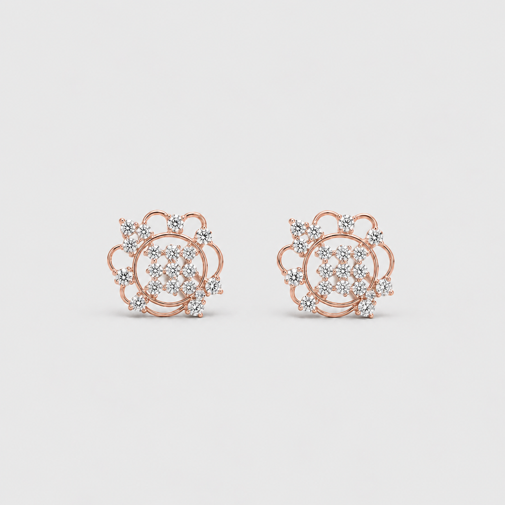 A pair of rose gold stud earrings with intricate diamond pavé and floral detailing, displayed on a clean light gray background.
