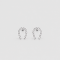A pair of silver horseshoe-shaped stud earrings set with small clear stones, displayed on a light gray background.