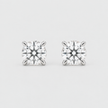 A pair of round-cut diamond stud earrings in a six-prong setting, shown on a light gray background.