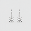 A pair of silver leverback earrings with square-cut clear gemstones in four-prong settings, shown on a light gray background.