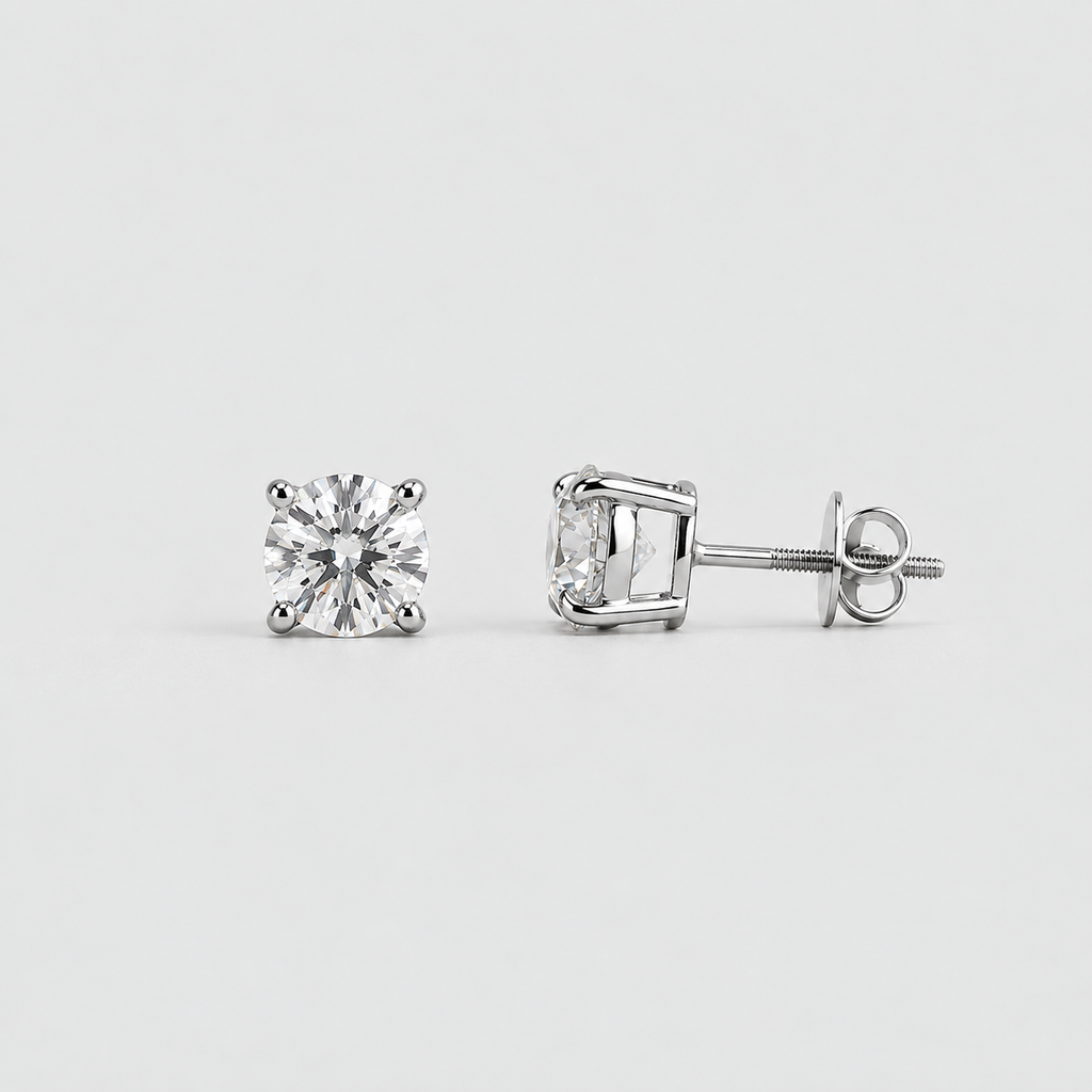 A pair of square-cut diamond stud earrings in a four-prong setting, one shown from the front and the other from the side/back, on a light gray background.