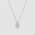 A pear-cut diamond pendant necklace on a delicate silver chain, set against a solid light gray background.