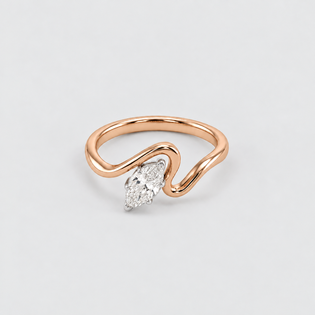 A rose gold ring with a wavy, open band design and a marquise-cut diamond set in a silver-colored setting, shown on a light gray background.