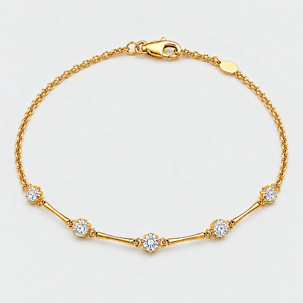 A yellow gold chain bracelet with a lobster clasp and five floral diamond settings, photographed on a clean white background.