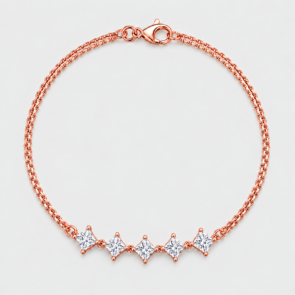 A rose gold chain bracelet with five diamond-cut clear gemstones set in a row on a light gray background.