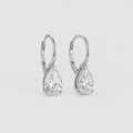A pair of silver leverback earrings with pear-cut clear gemstones, displayed on a clean light gray background.