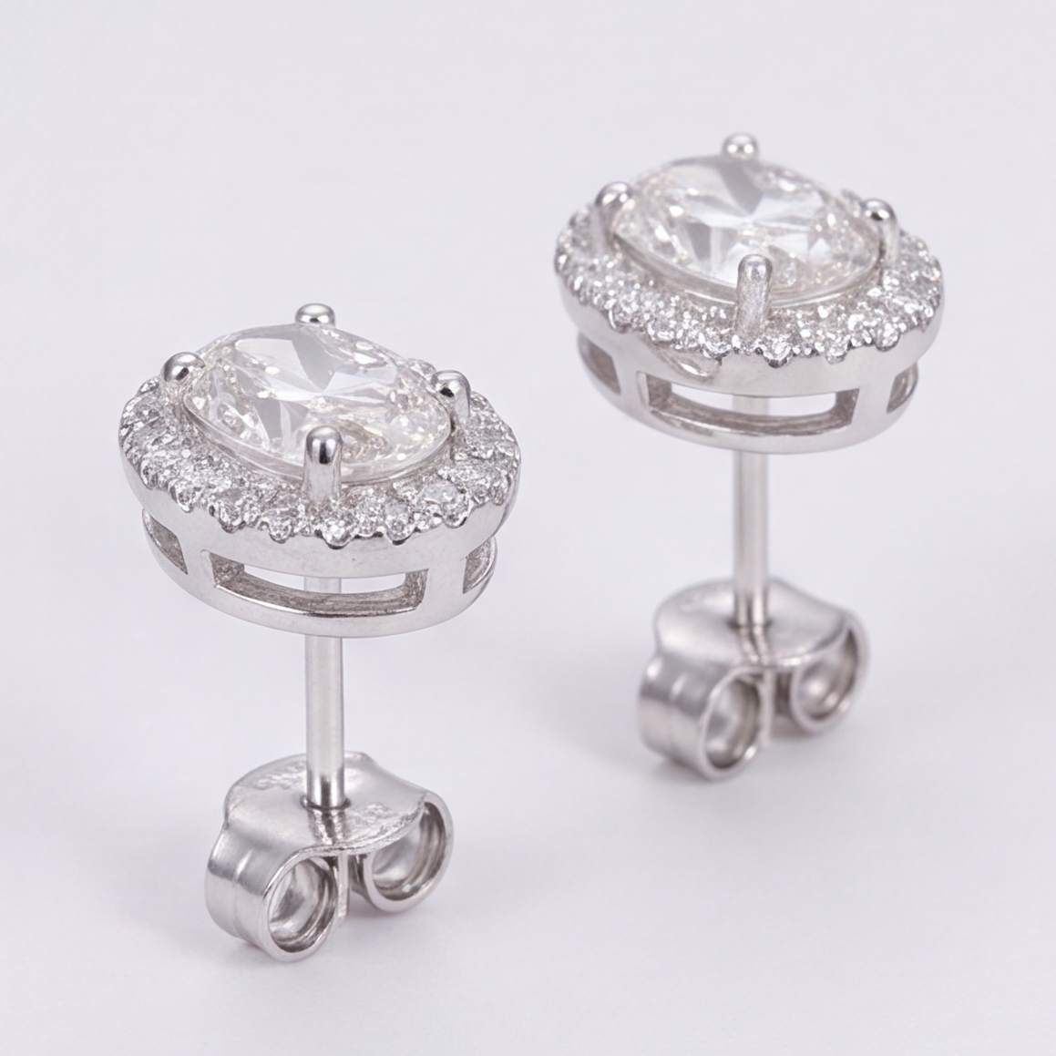 4.50 Ct. Oval Cut Lab Grown Diamond Halo Stud Earrings (VS-EF)