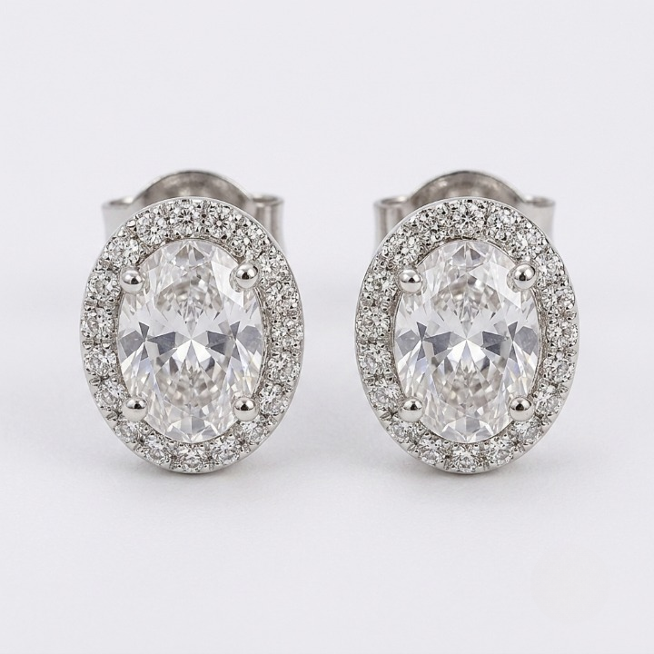 4.50 Ct. Oval Cut Lab Grown Diamond Halo Stud Earrings (VS-EF)