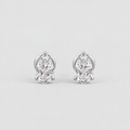 A pair of pear-cut diamond stud earrings in a silver-tone setting, displayed on a clean light gray background.