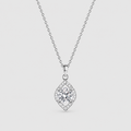 A silver diamond-shaped pendant necklace featuring a central round-cut diamond surrounded by a halo of smaller diamonds, suspended from a delicate silver chain against a light gray background.