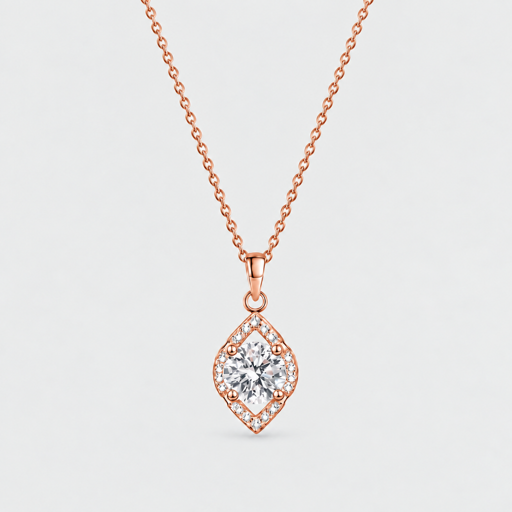 Rose gold diamond pendant necklace with a marquise-shaped clear center stone and small surrounding stones on a delicate chain, shown on a light gray background.