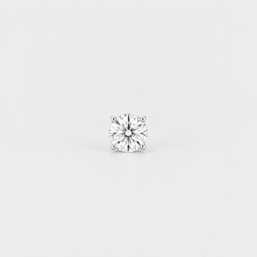 A single round brilliant-cut diamond solitaire stud in a four-prong setting, shown on a clean, light gray background.