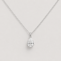 A silver chain necklace with a pear-cut clear gemstone pendant, displayed against a light gray background.