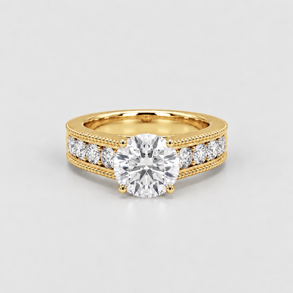 A yellow gold diamond ring with a large round center stone and smaller diamonds set along the shoulders, photographed on a clean light gray background.