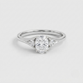A silver engagement ring featuring a central oval-cut diamond surrounded by smaller round and marquise-cut diamonds on a polished silver band, set against a clean light gray background.