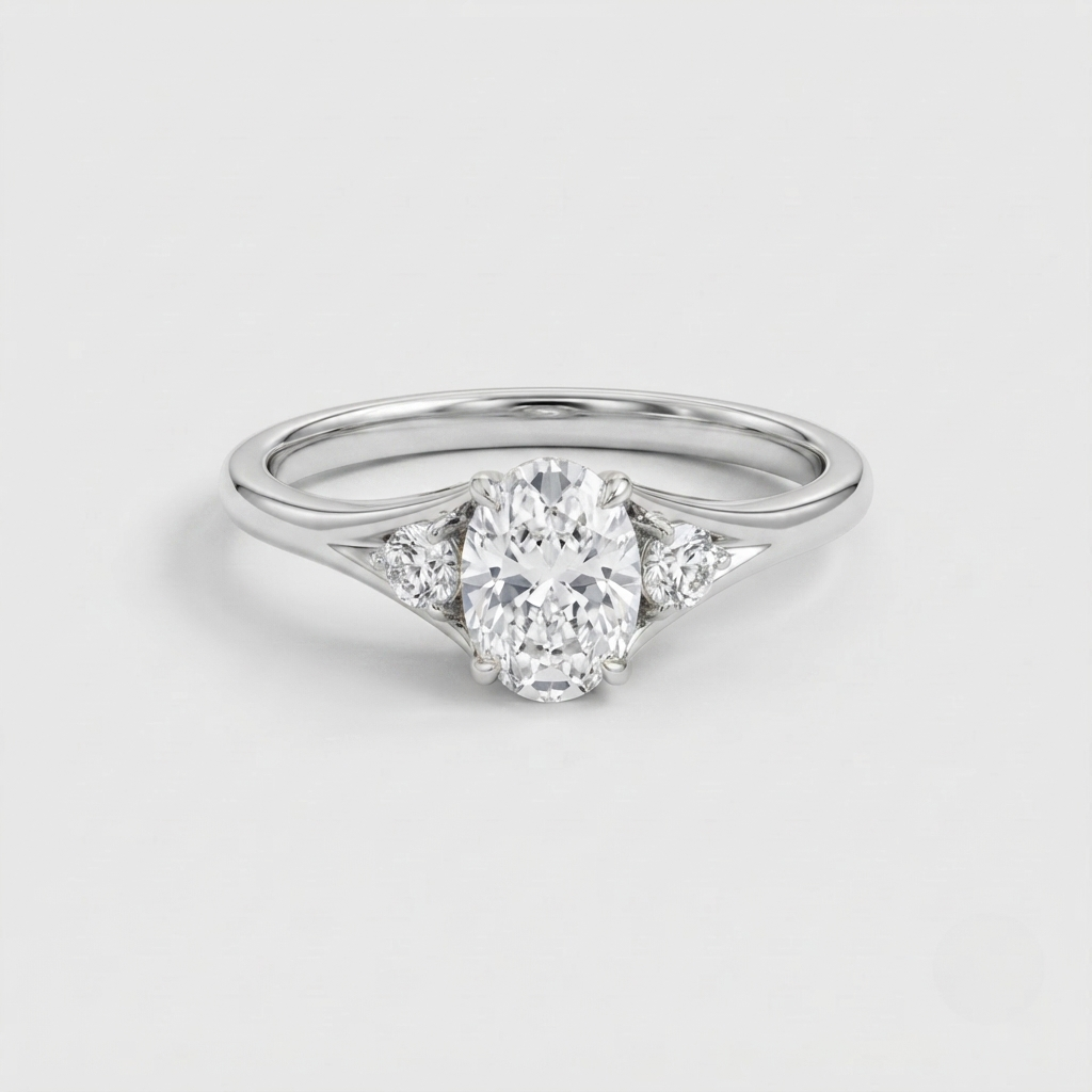 A silver engagement ring featuring a central oval-cut diamond surrounded by smaller round and marquise-cut diamonds on a polished silver band, set against a clean light gray background.