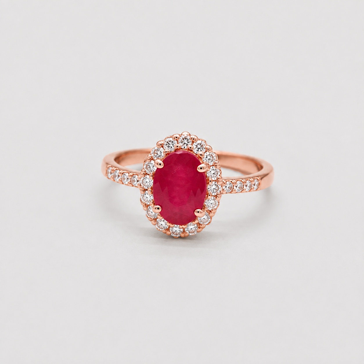 1 Ct. Oval Cut Ruby Tone Halo Ring with Lab-Grown Diamond Side Stones
