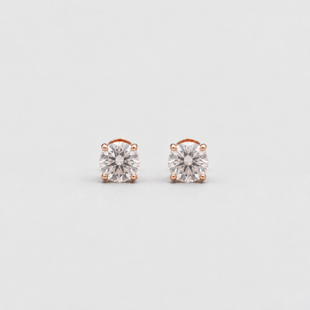 Pair of stud earrings on a white background