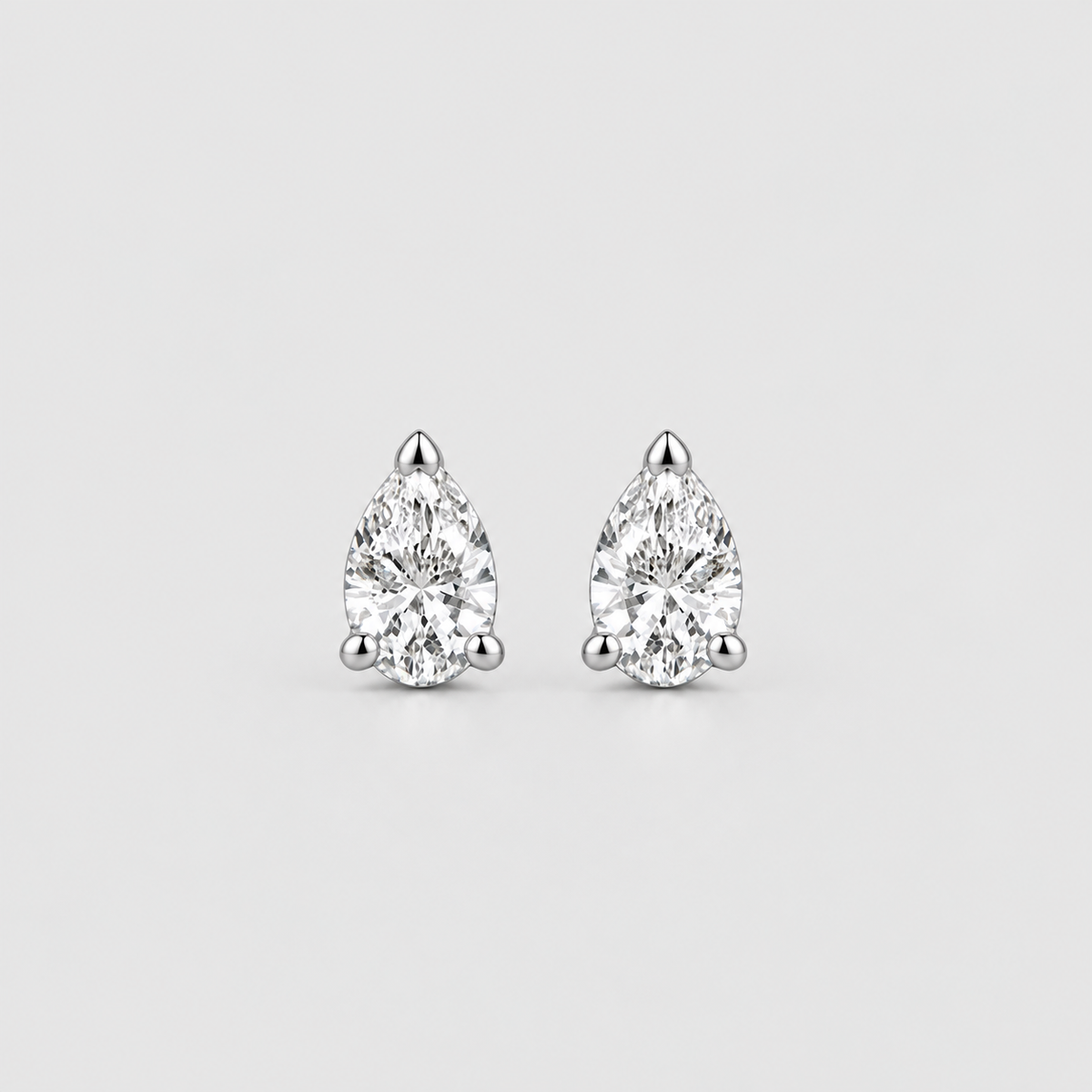 1 Ct. Lab Grown Diamond Pear Cut Stud Earrings (EF/VVS-VS)