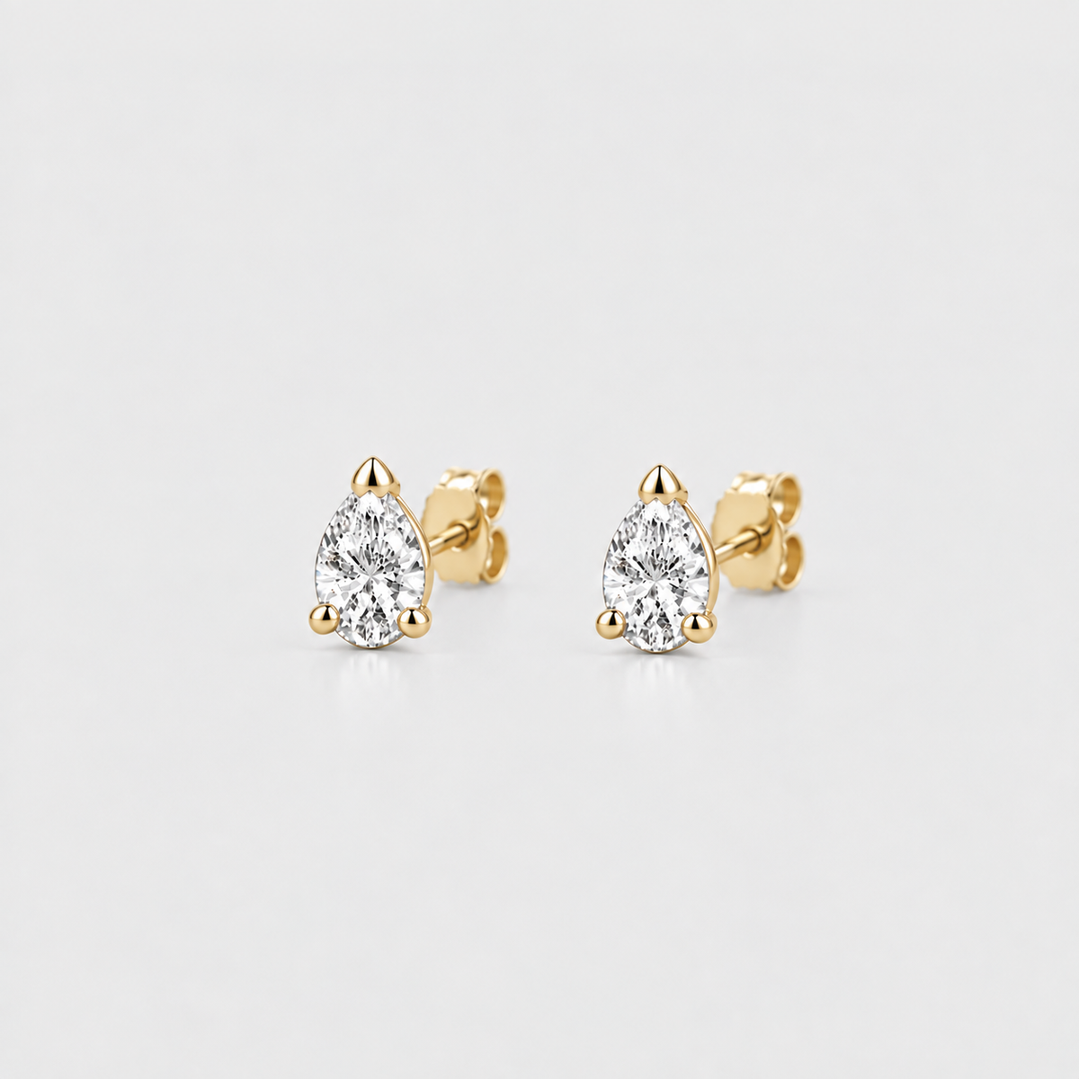 1 Ct. Lab Grown Diamond Pear Cut Stud Earrings (EF/VVS-VS)