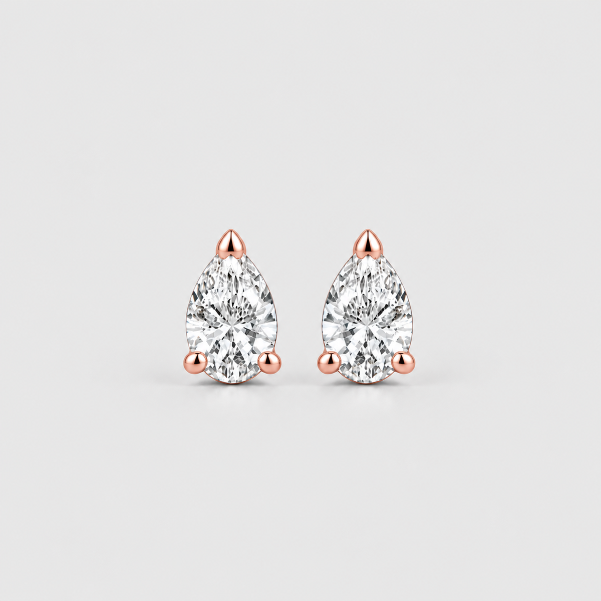 1 Ct. Lab Grown Diamond Pear Cut Stud Earrings (EF/VVS-VS)
