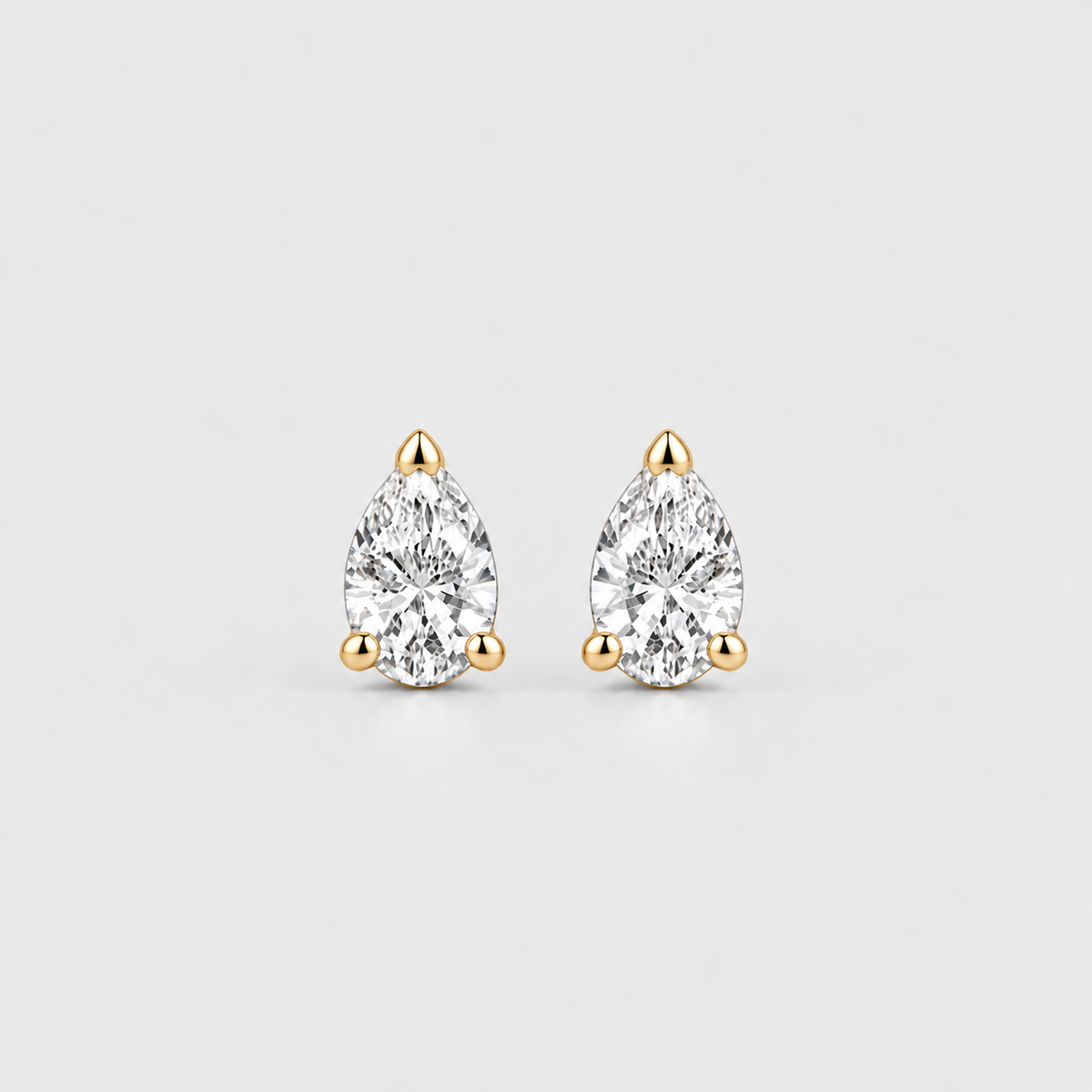 1 Ct. Lab Grown Diamond Pear Cut Stud Earrings (EF/VVS-VS)