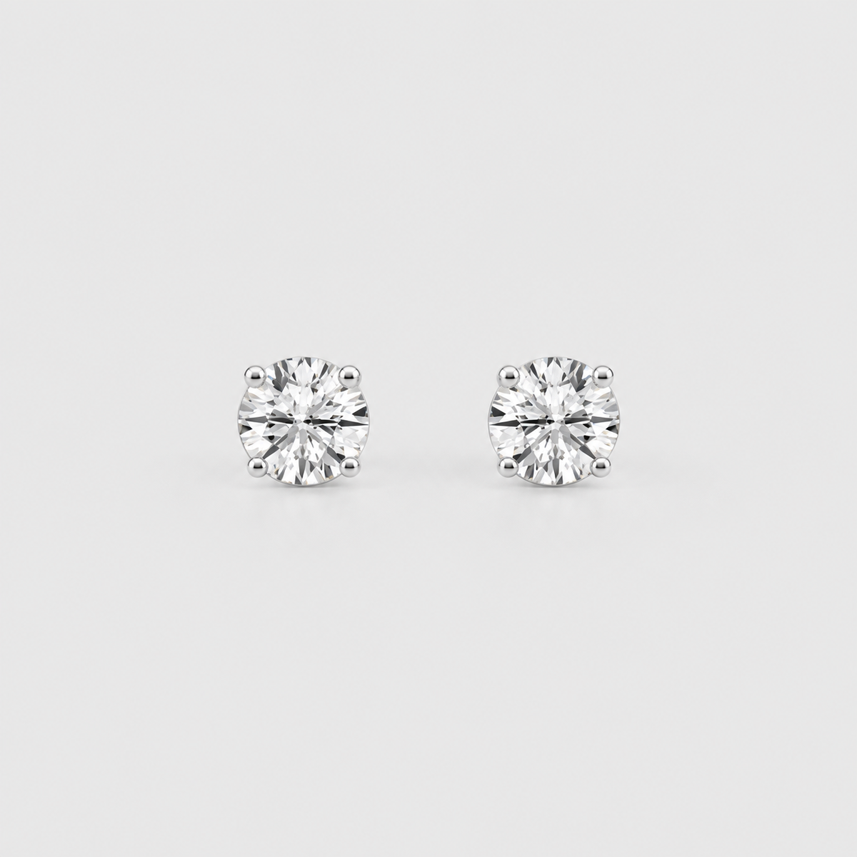 1 Ct. Lab Grown Diamond Round Cut Stud Earrings (EF/VVS-VS)
