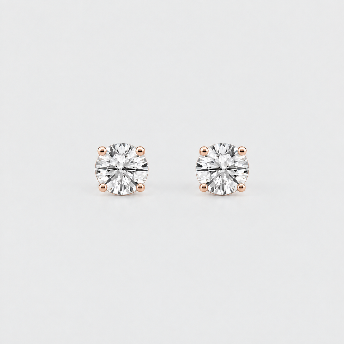 1 Ct. Lab Grown Diamond Round Cut Stud Earrings (EF/VVS-VS)