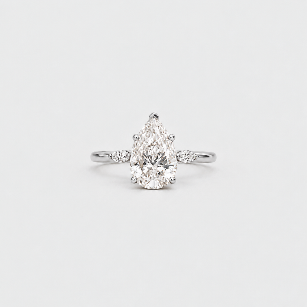 3.10 Ct. Lab Grown Diamond Pear & Marquise Three Stone Ring (VS-EF)